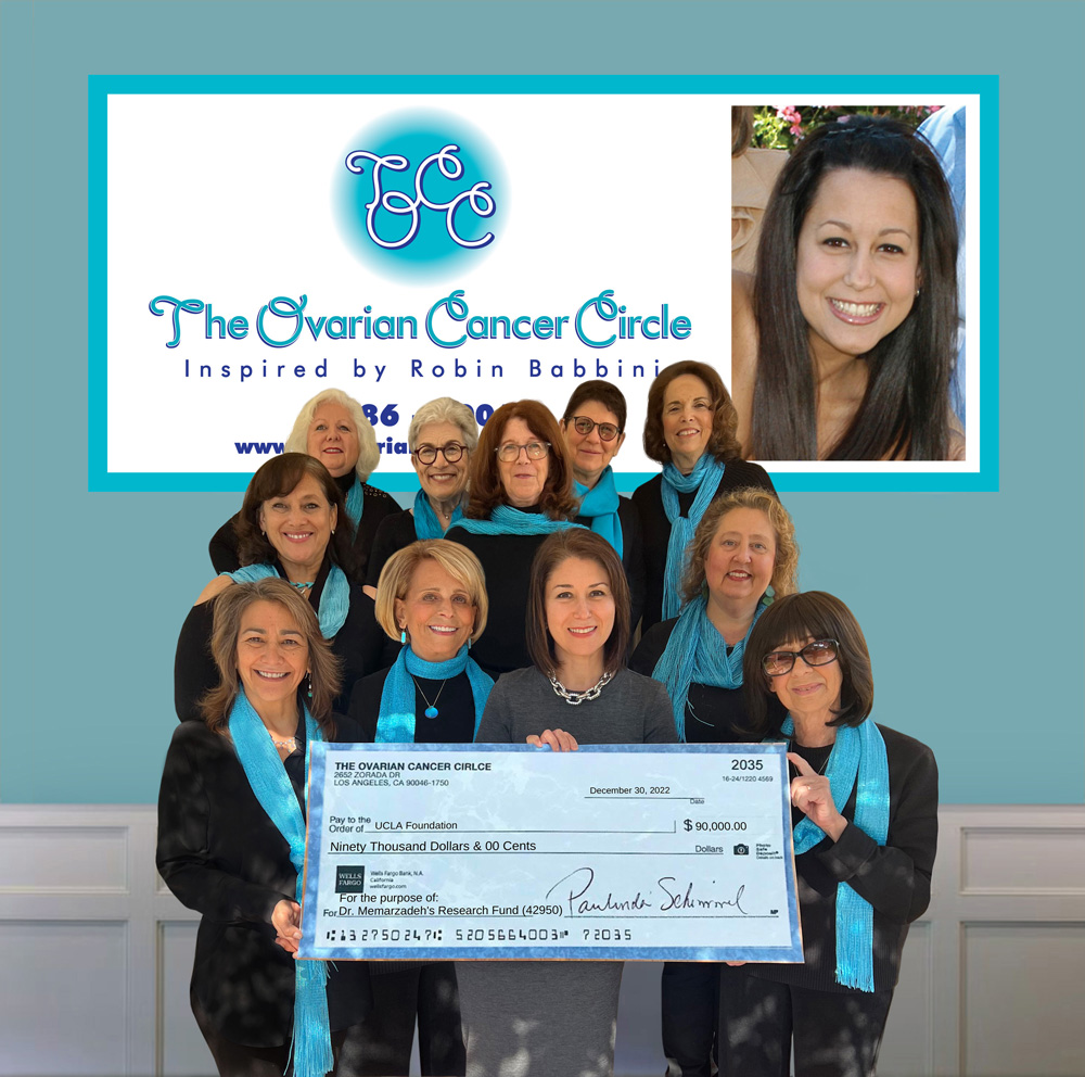 The Ovarian Cancer Circle presents a $90,000 check for cancer research