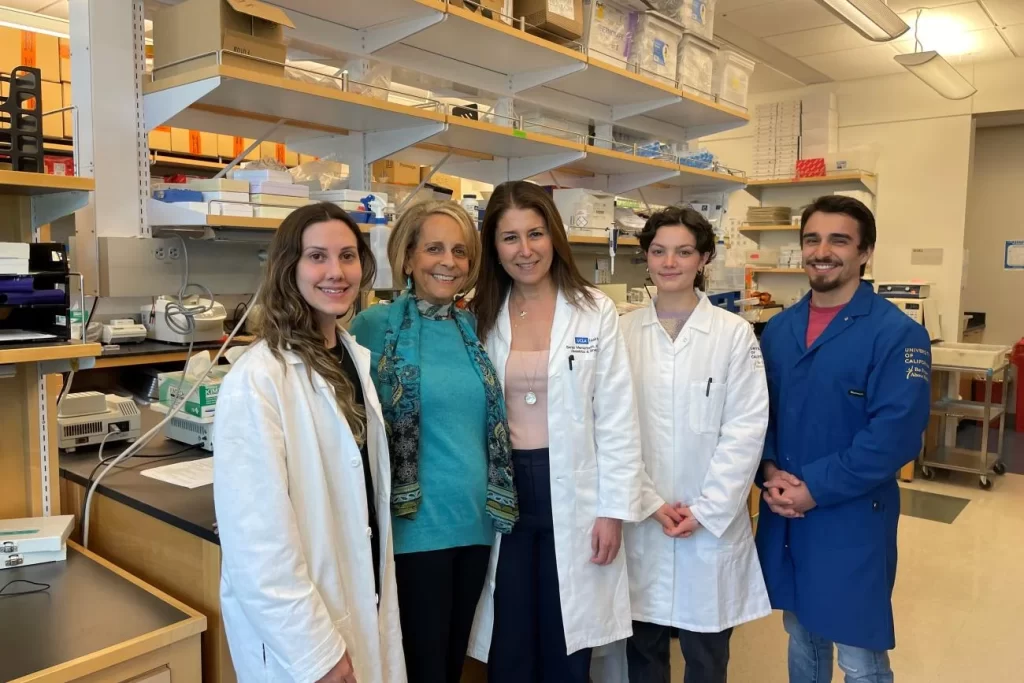 The Ovarian Cancer Circle Founder Paulinda Babbini with Dr. Sanaz Memarzadeh and her team in the research center lab